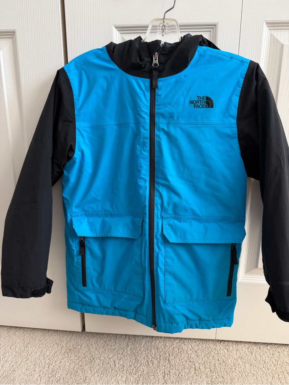 The North Face Kids' Blue and Black Hooded Jacket. Boys Medium 10-12